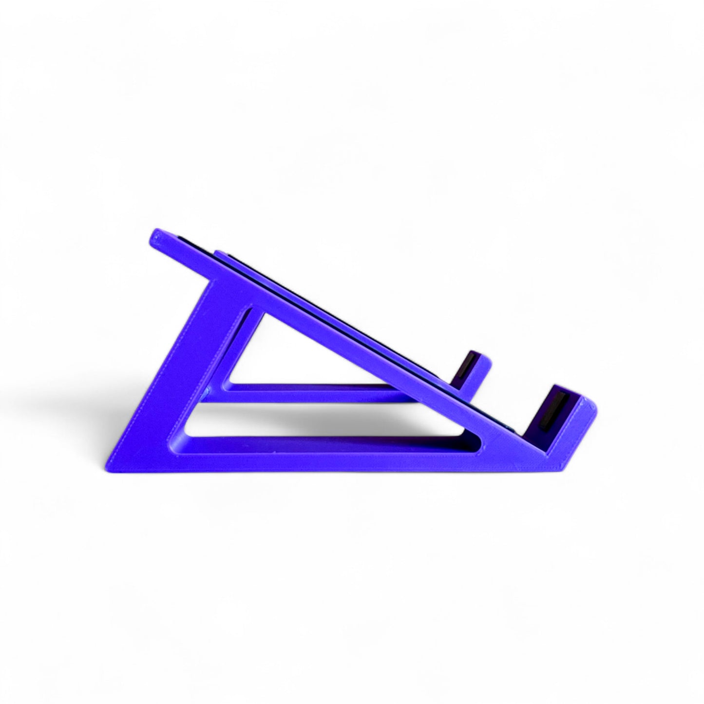 3D printed Behringer TD-3 / RD-6 / RD-78 Synth 30 degree stand by Cold Earth Industries, shown side view in purple on a white background