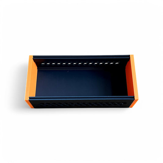 3D printed 52HP 3U Eurorack modular synthesizer case by Cold Earth Industries, shown front view with black body and orange side panels on a white background – custom desktop skiff enclosure.