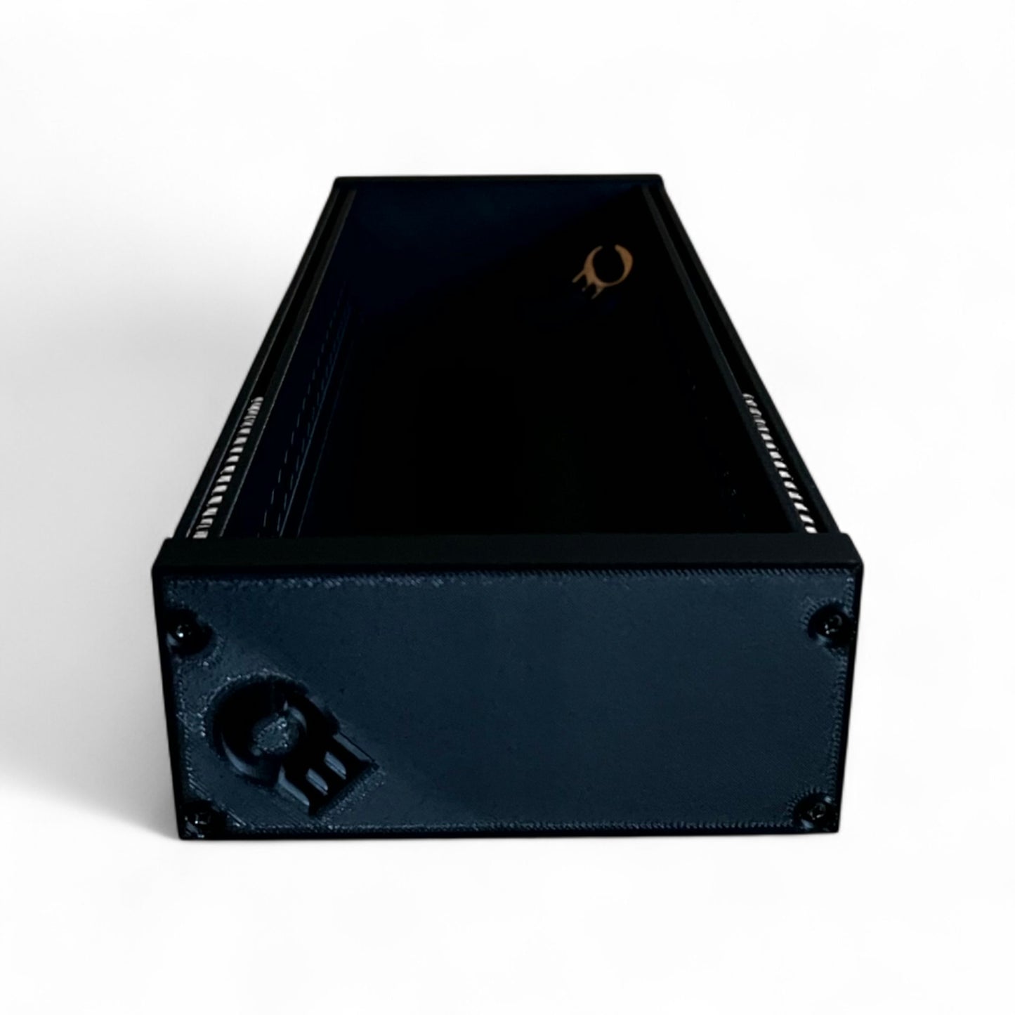 3D printed 62HP 3U Eurorack modular synthesizer case by Cold Earth Industries, shown with black body and black side panels, elevated side view, on a white background – custom desktop skiff enclosure.
