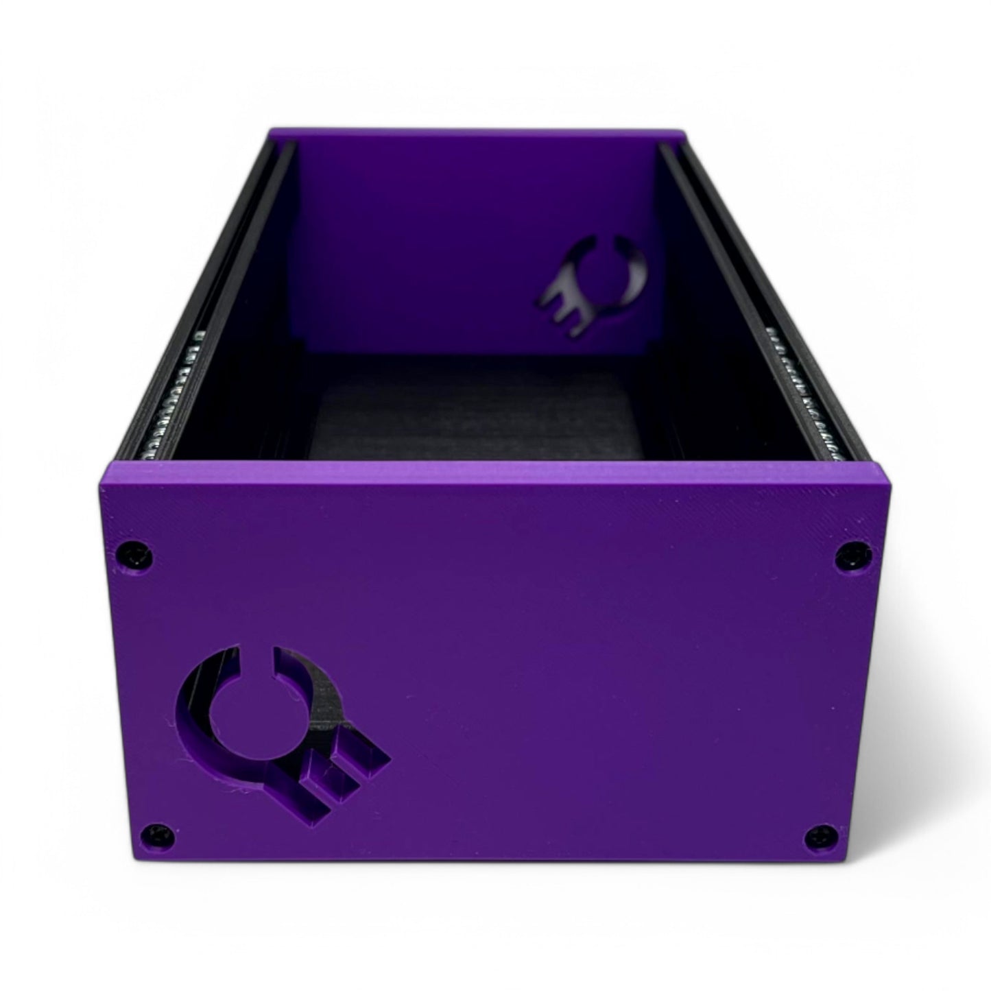 3D printed 62HP 3U Eurorack modular synthesizer case by Cold Earth Industries, shown side view with black body and purple side panels on a white background – custom desktop skiff enclosure.