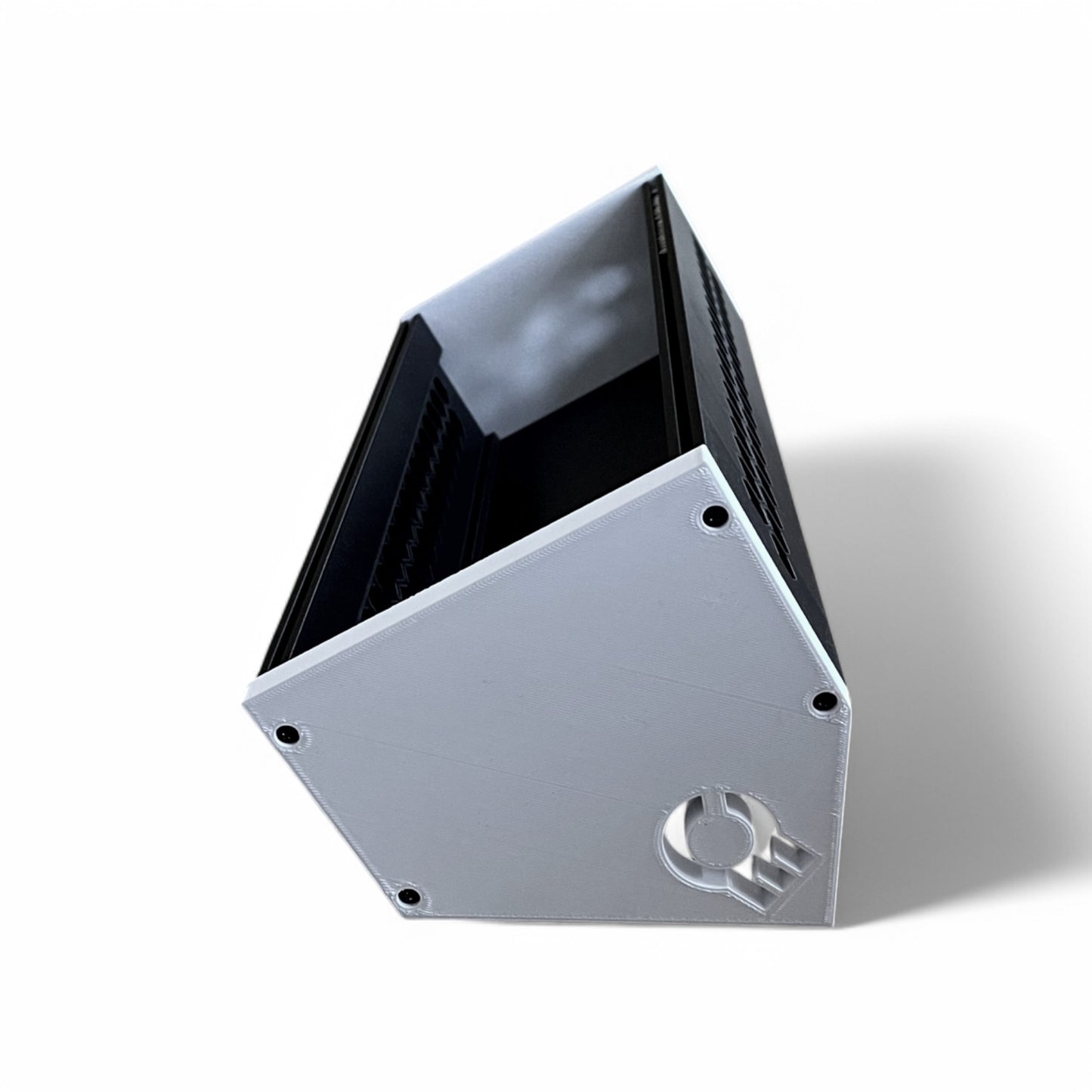 3D printed 62HP 3U Eurorack modular synthesizer case by Cold Earth Industries, shown side view with black body and white side panels on a white background – custom desktop skiff enclosure.