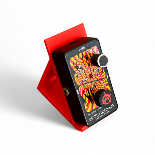 3D printed Anarchy Sign Guitar Pedal Footswitch Topper by Cold Earth Industries, shown on a guitar pedal, black with a red anarchy symbol on a white background.