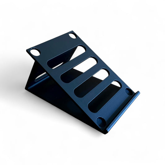 3D printed Behringer BM-11M, BM-12, BM-13, BM-14M, BM-15M Guitar Pedal 30 Degree stand by Cold Earth Industries, shown in black on a white background – custom desktop stands.