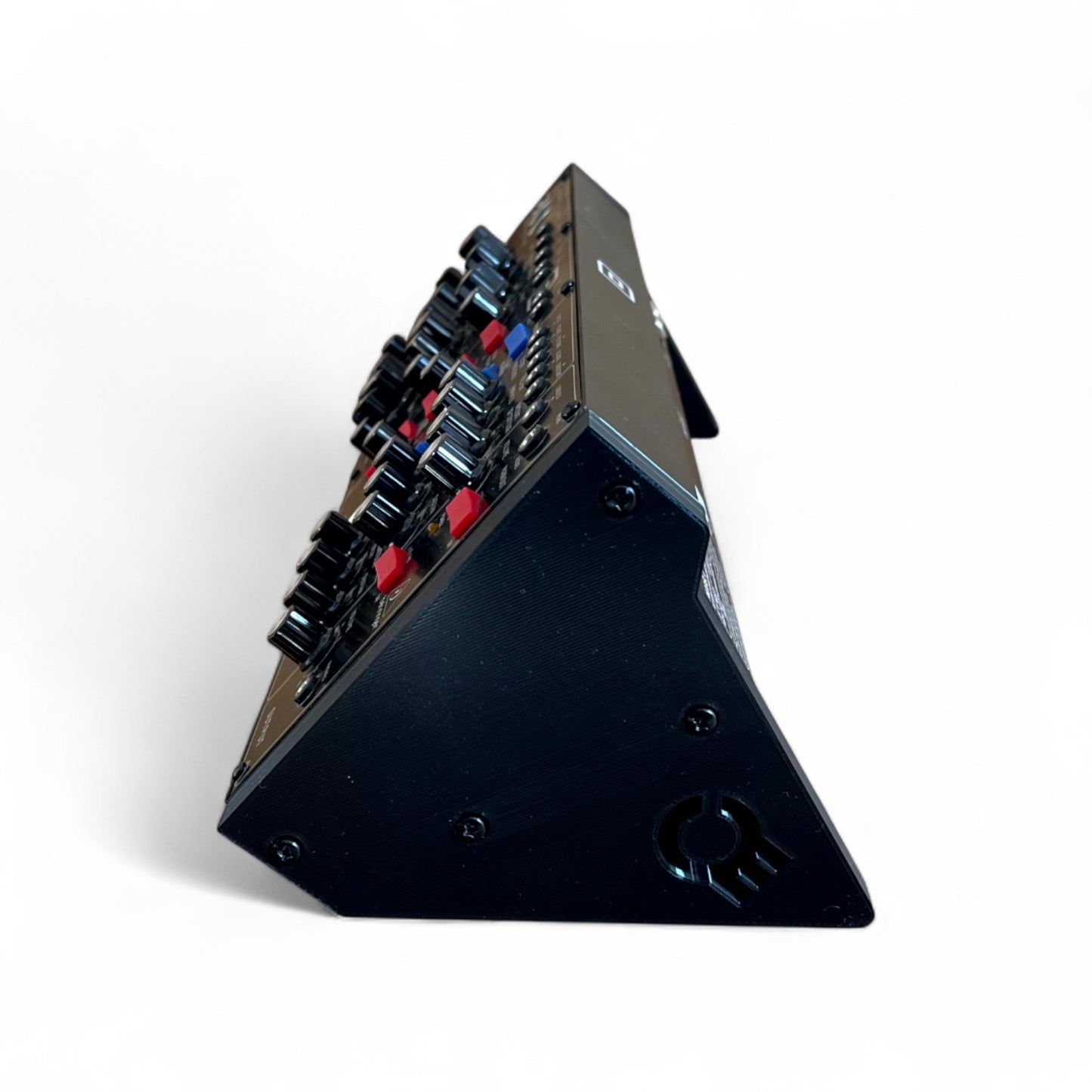 3D printed Behringer Synthesizer Solid Side Panels Synth stand by Cold Earth Industries, shown in black on a white background Side View with Behringer Model D (not included) – custom desktop stands.