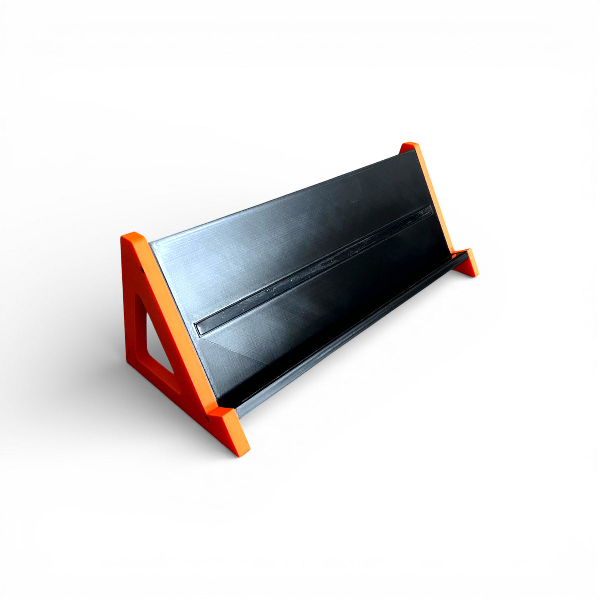 3D printed Guitar Pedal Desktop Stand - Open Sides 400mm x 150mm 60 Degree Pedalboard & Synth Stand stand by Cold Earth Industries, shown in black with Orange Sides, on a white background β custom desktop stands.