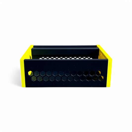 3D printed 42HP 4U Eurorack modular synthesizer case by Cold Earth Industries, shown front view with black body and yellow side panels on a white background – custom desktop skiff enclosure.