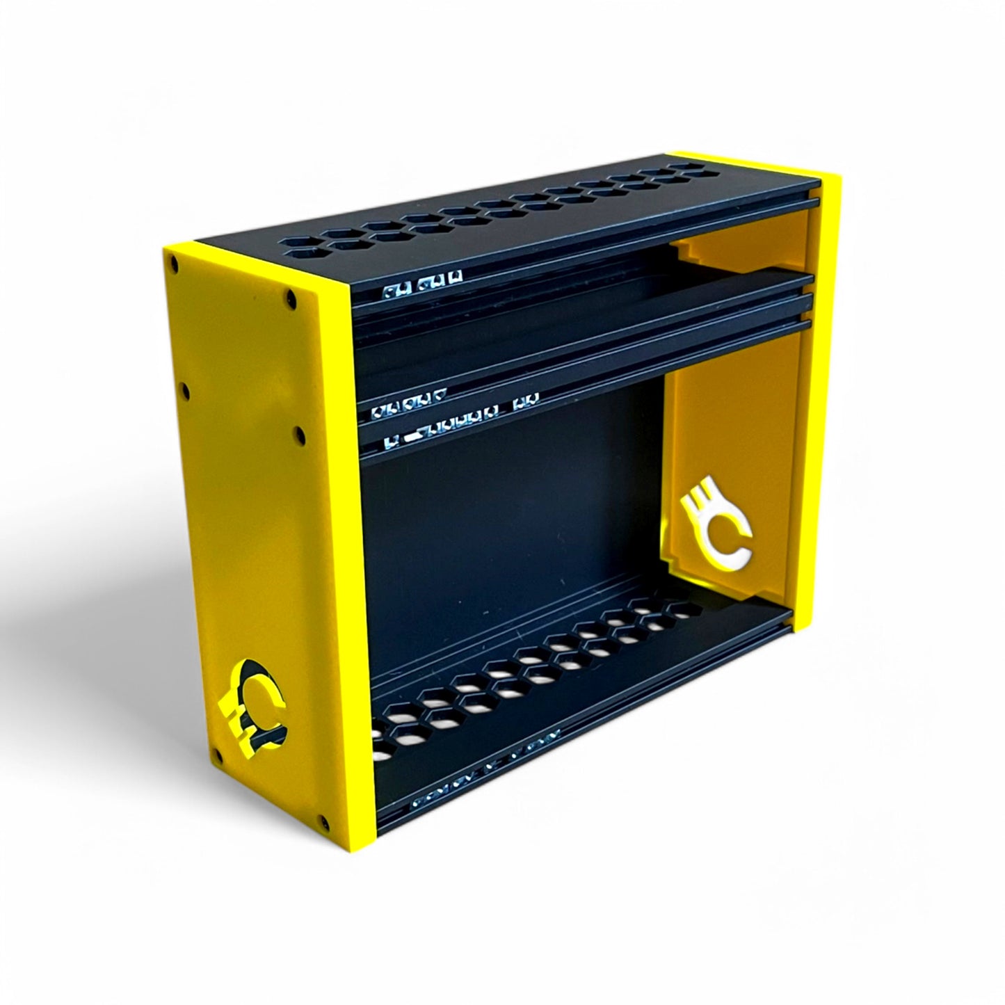 3D printed 42HP 4U Eurorack modular synthesizer case by Cold Earth Industries, shown upright front view with black body and yellow side panels on a white background – custom desktop skiff enclosure.