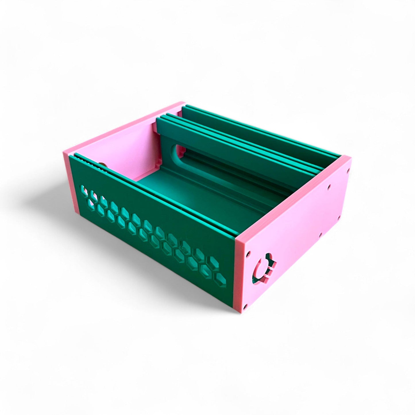 3D printed 42HP 4U Eurorack modular synthesizer case by Cold Earth Industries, shown with green body and pink side panels on a white background – custom desktop skiff enclosure.