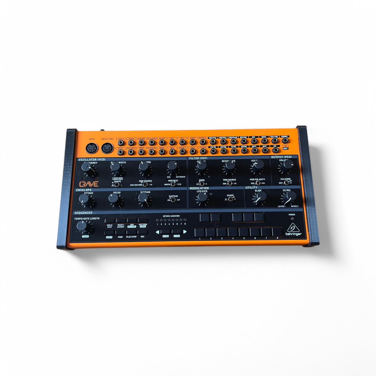 3D printed Behringer Crave / Edge / Spice / Grind Side Panels Synth stand by Cold Earth Industries, shown front view with Behringer Crave in black on a white background β custom desktop stands.