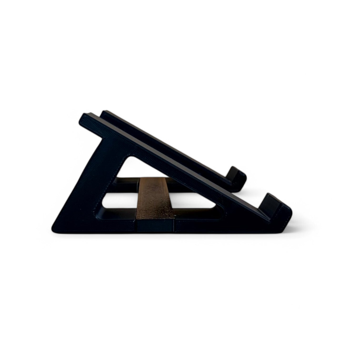 3D printed Cold Earth Industries Small Synth stand by Cold Earth Industries, 30 degree angle side view, shown in black on a white background – custom desktop stands.