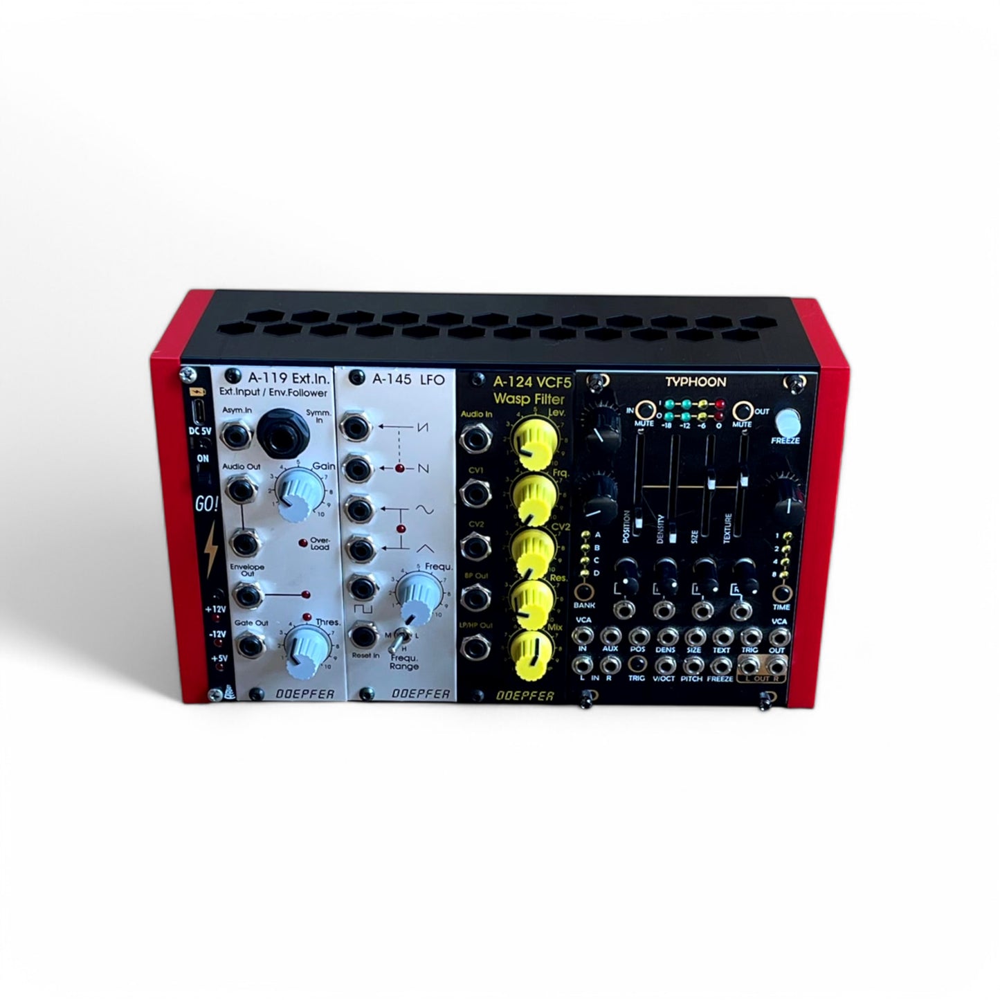 3D printed 42HP 3U Eurorack modular synthesizer case by Cold Earth Industries, shown with black body and red side panels, filled with eurorack moduels, upright on a white background – custom desktop skiff enclosure.