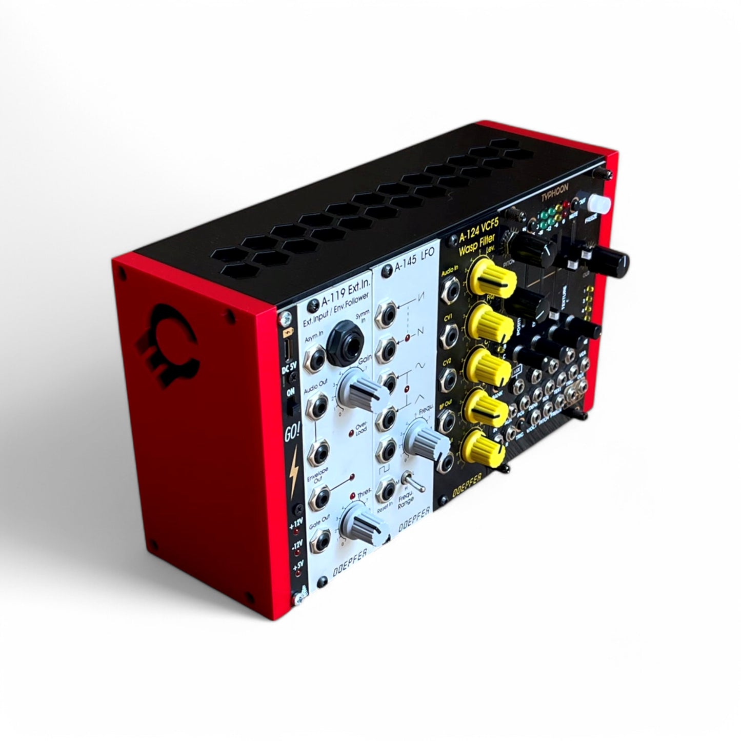 3D printed 42HP 3U Eurorack modular synthesizer case by Cold Earth Industries, shown with black body and red side panels, filled with eurorack moduels, upright at an angle, on a white background – custom desktop skiff enclosure.