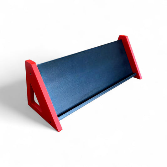 3D printed Desktop Pedalboard 400mm x 150mm 60 Degree Guitar Pedal & Synth Stand stand by Cold Earth Industries, shown in black with red sides on a white background – custom desktop stands.