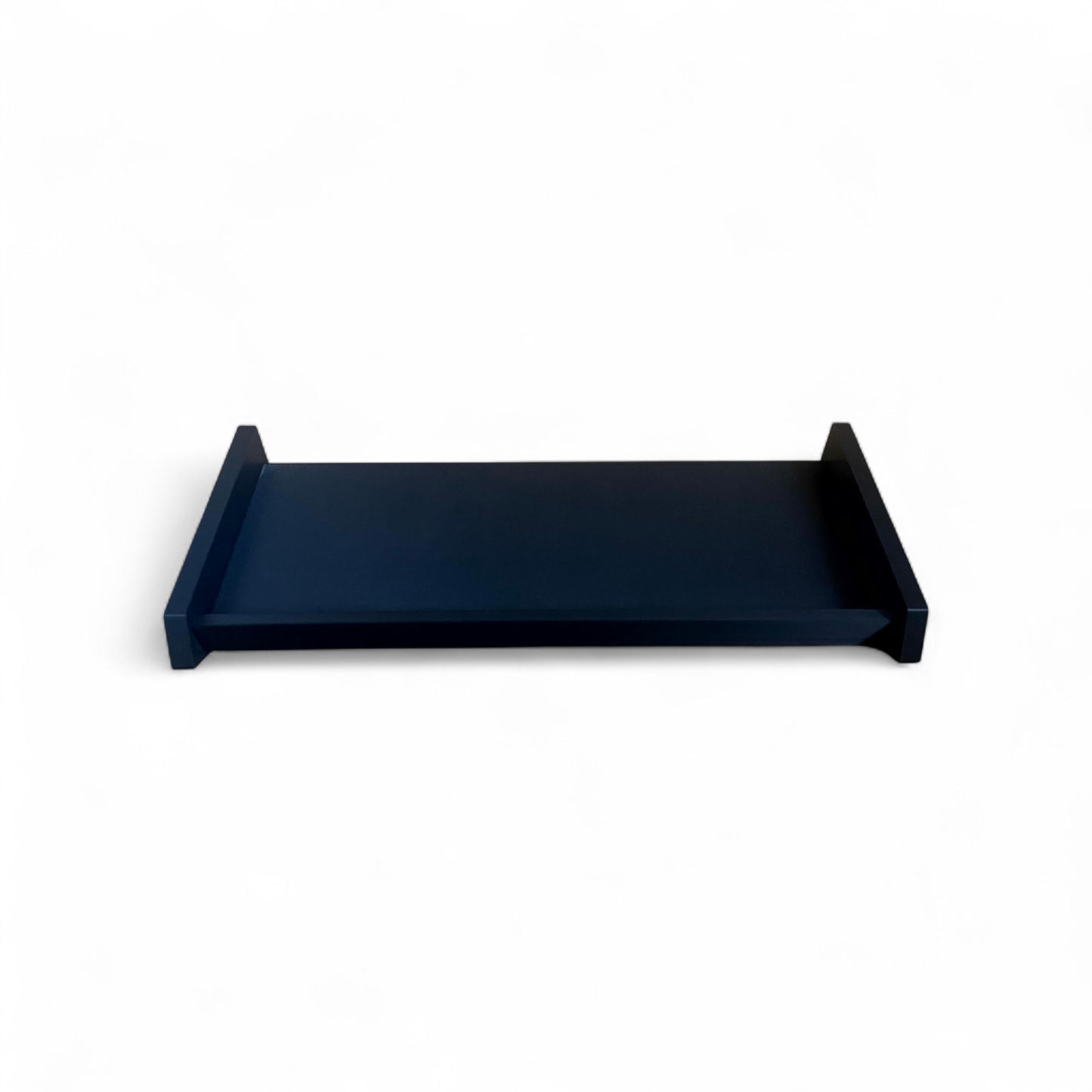 3D printed Desktop Pedalboard 400mm x 150mm 30 Degree Guitar Pedal & Synth Stand stand by Cold Earth Industries, shown from in front, in black, on a white background – custom desktop stands.