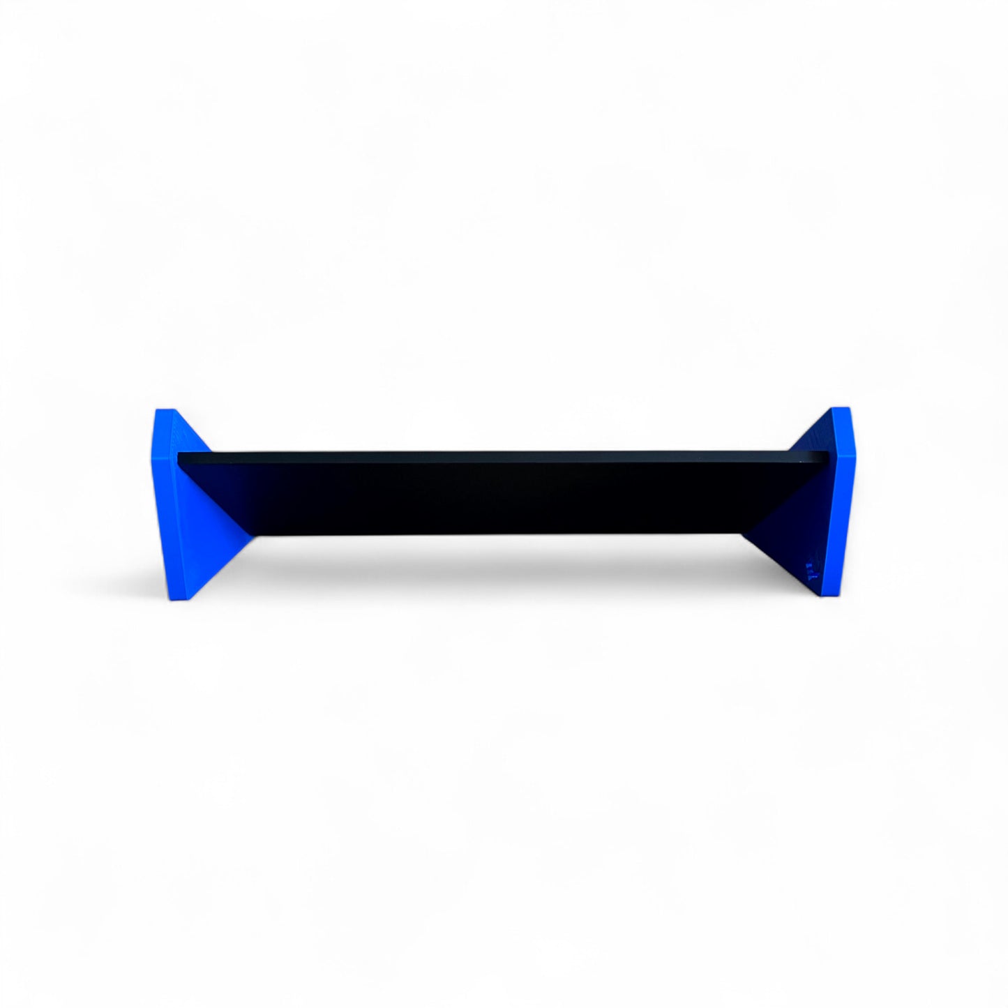 3D printed Desktop Pedalboard 400mm x 150mm 30 Degree Guitar Pedal & Synth Stand stand by Cold Earth Industries, shown from behind, in black with blue sides, on a white background – custom desktop stands.
