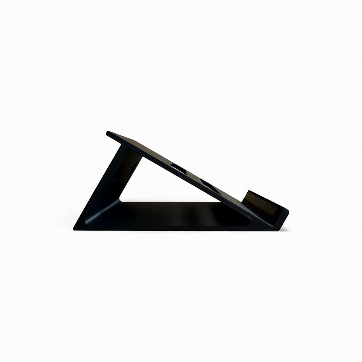 3D printed ElectroHarmonix Big Muff Pi Guitar Pedal 30 Degree stand by Cold Earth Industries, shown side view, in black on a white background