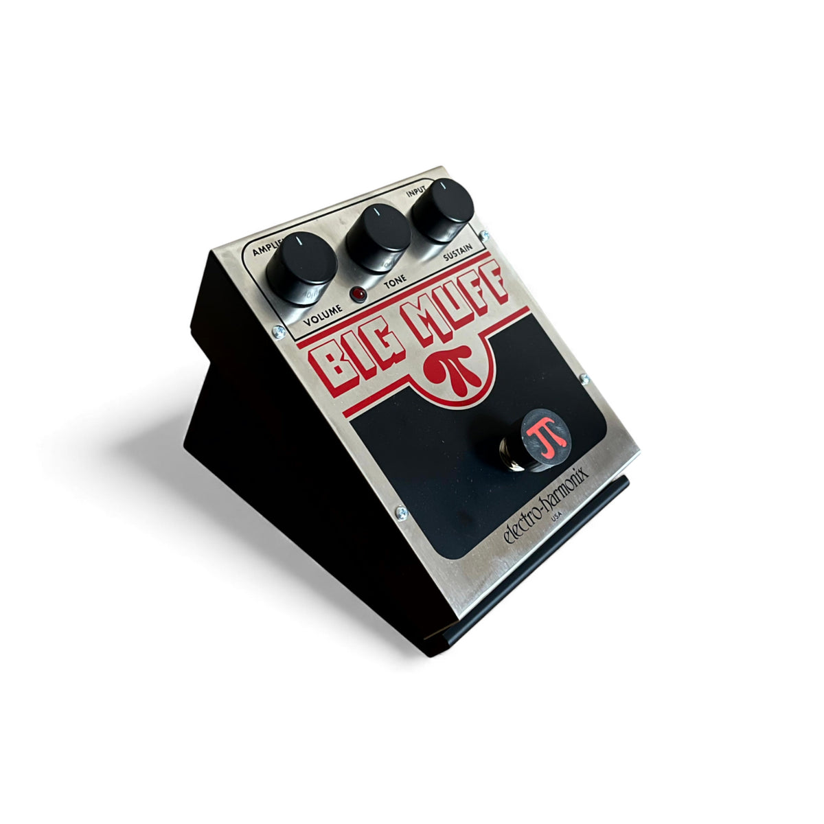 3D printed ElectroHarmonix Big Muff Pi Guitar Pedal 30 Degree stand by Cold Earth Industries, shown in black on a white background holding a ElectroHarmonix Big Muff Pi