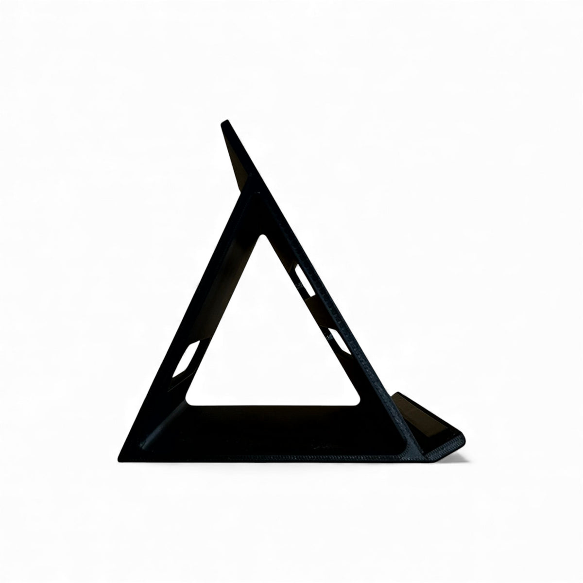 3D printed ElectroHarmonix Big Muff Pi Guitar Pedal 60 Degree stand by Cold Earth Industries, shown side view, in black on a white background