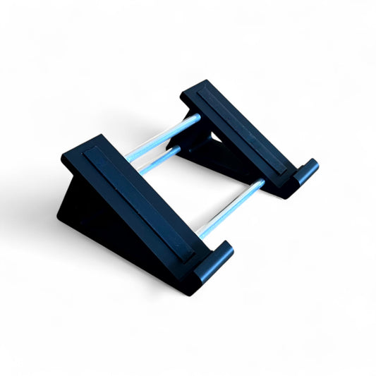 3D printed Empress Reverb / Echosystem Guitar Pedal 30 Degree stand by Cold Earth Industries, shown in black on a white background – custom desktop stands.