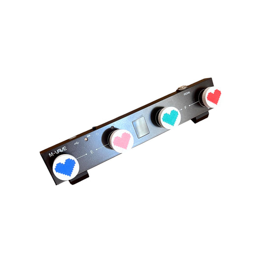 Low Profile Guitar Pedal Footswitch Topper for 8.5mm / 10mm / 11mm Foot Switch. 3D printed Heart Design on White Toppers with a Green, Red, Pink and Blue heart by Cold Earth Industries, shown on a guitar pedal on a white background.