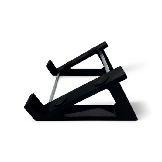 3D printed Dreadbox Typhon Synth 30 degree stand by Cold Earth Industries, shown side view in black on a white background