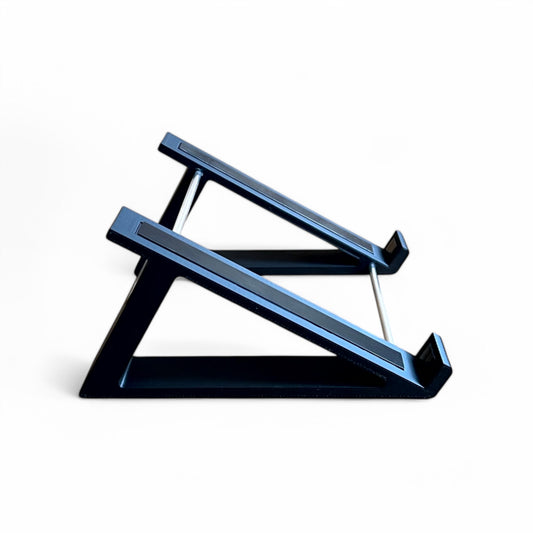 3D printed Synthtrom Audible Deluge Synth 30 degree stand by Cold Earth Industries, shown side view in black on a white background