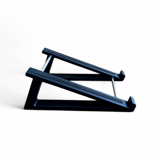 3D printed Presonus Atom Midi Controller 20 degree stand with rubber strips by Cold Earth Industries, shown side view in black on a white background