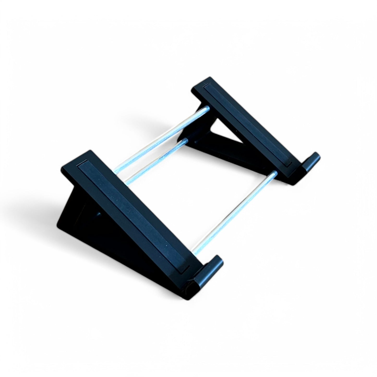 3D printed Dreadbox Nymphes Synth 30 degree stand by Cold Earth Industries, shown in black on a white background