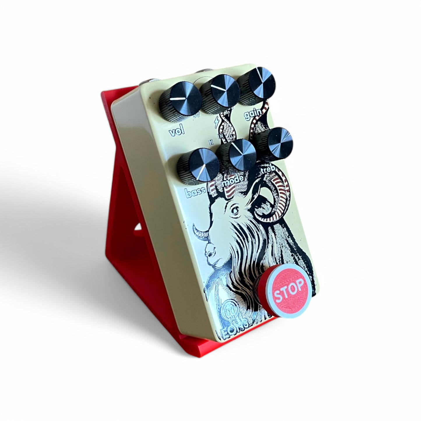 Low Profile Guitar Pedal Footswitch Topper for 8.5mm / 10mm / 11mm Foot Switch. 3D printed Stop Sign in a Red and White Design by Cold Earth Industries, shown on Red guitar Pedal Stand on a Walrus Audio Eons on a white background.