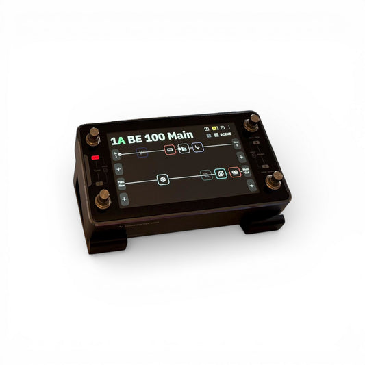 3D printed Neural DSP Quad Cortex Mini Guitar Pedal 30 Degree stand by Cold Earth Industries, shown in black on a white background, with the Quad Cortex Mini – custom desktop stands.