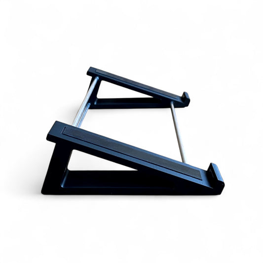 3D printed Korg Minilogue XD Module Synth 20 degree stand by Cold Earth Industries, shown side view in black on a white background