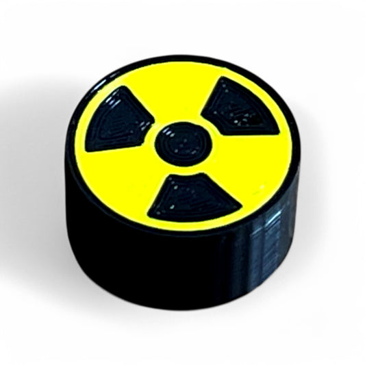 3D printed Radiation Sign Guitar Pedal Footswitch Toppers Single by Cold Earth Industries, shown with a black and yellow Radiation Sign on a white background – custom
