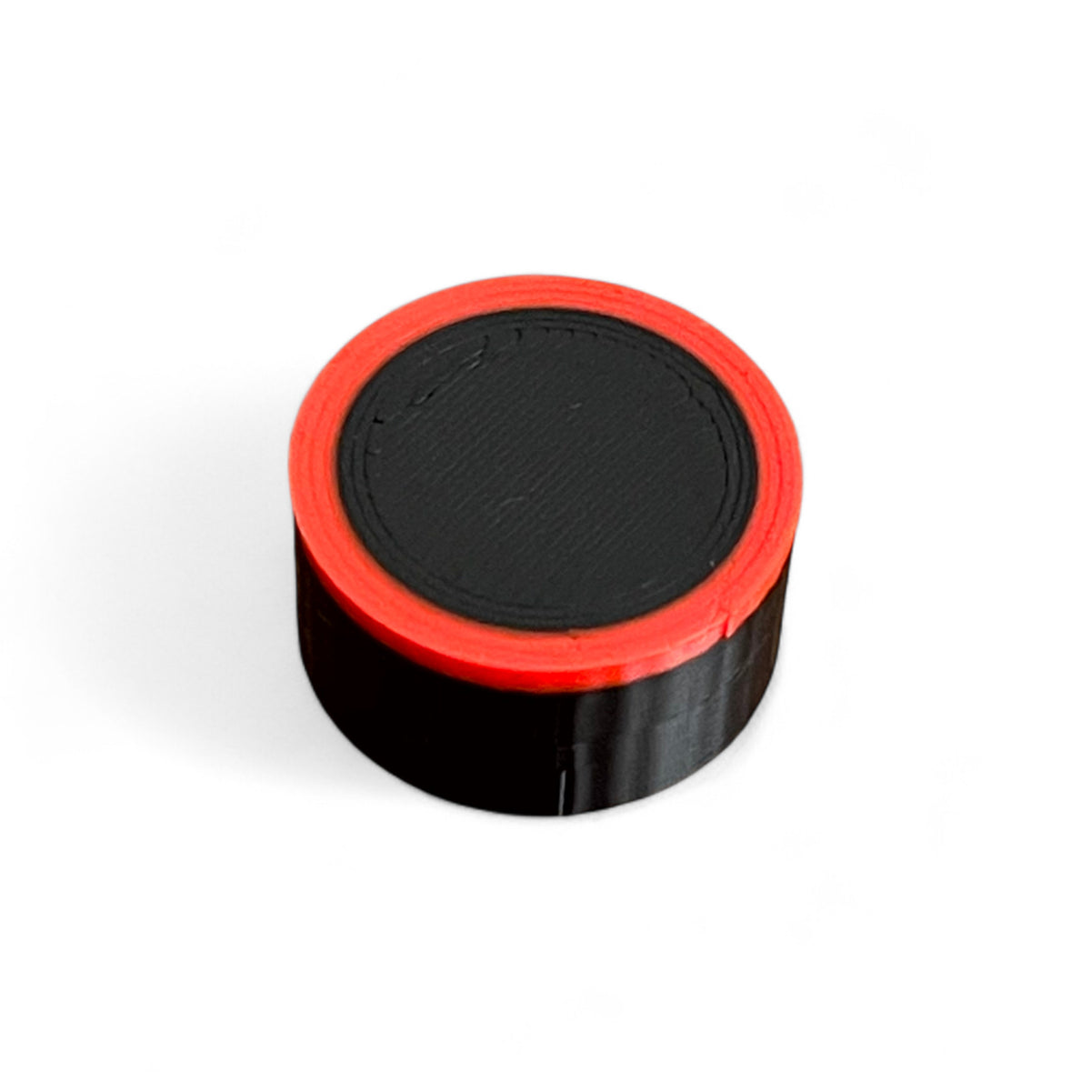 Guitar Pedal Footswitch Topper for 10MM Foot Switch. 3D printed Black Base and Red Ring Design by Cold Earth Industries, shown on a white background.