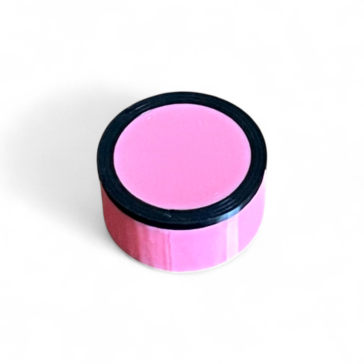 Guitar Pedal Footswitch Topper for 10MM Foot Switch. 3D printed Pink Base and Black Ring Design by Cold Earth Industries, shown on a white background.