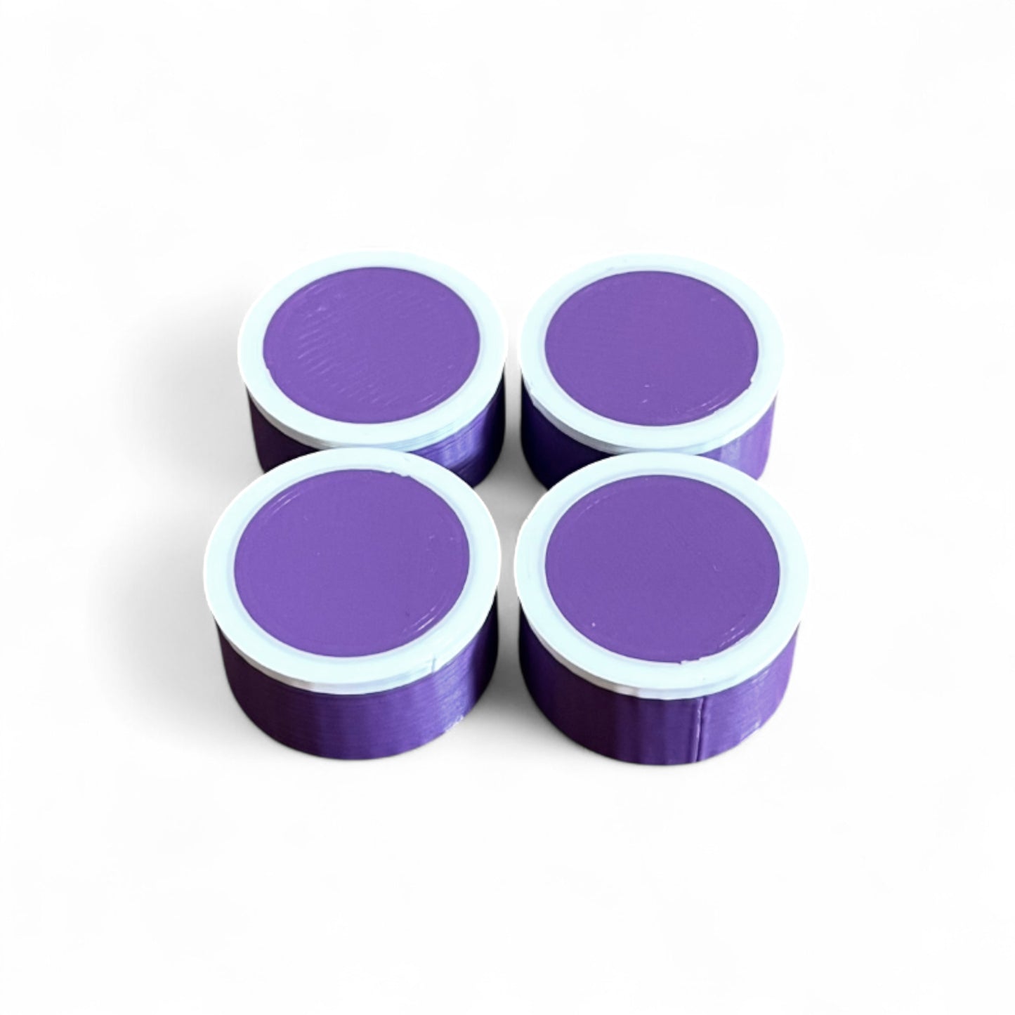 Set of 4 Guitar Pedal Footswitch Topper for 11MM Foot Switch. 3D printed Purple Base and White Ring Design by Cold Earth Industries, shown on a white background.