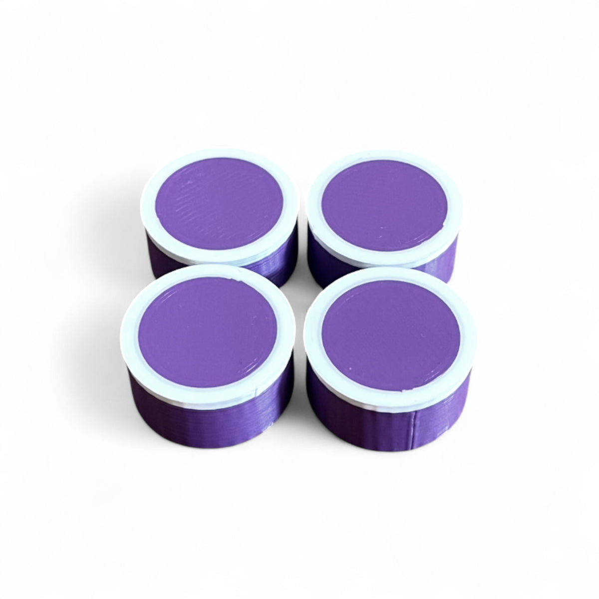 Set of 4 Guitar Pedal Footswitch Topper for 11MM Foot Switch. 3D printed Purple Base and White Ring Design by Cold Earth Industries, shown on a white background.