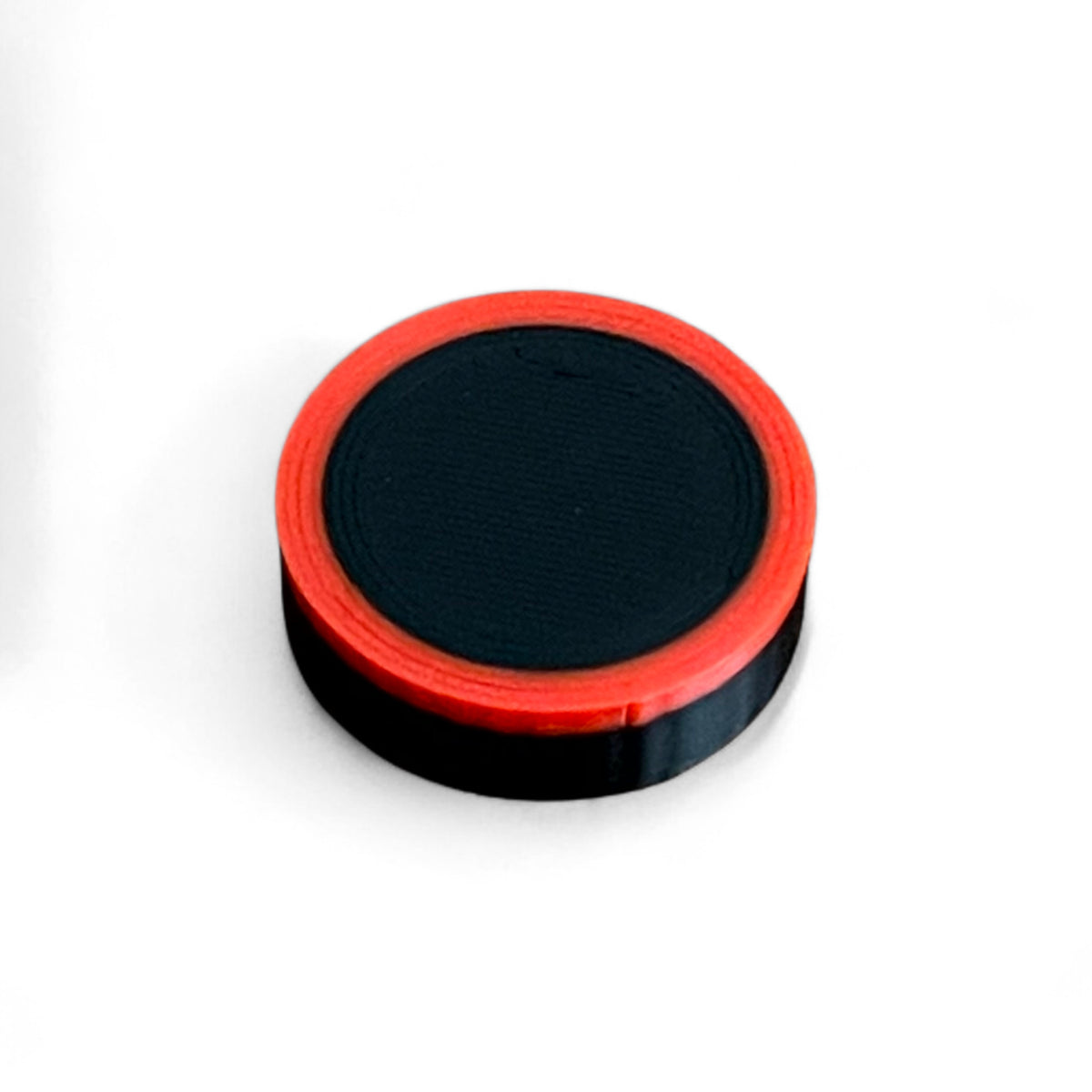 Guitar Pedal Footswitch Topper Low Profile for 11MM Foot Switch. 3D printed Black Base and Red Ring Design by Cold Earth Industries, shown on a white background.
