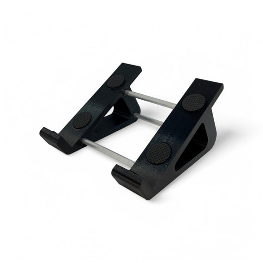 3D printed DSI / Sequential Mopho / Tetra Synth stand by Cold Earth Industries, shown in black on a white background – custom desktop stands.