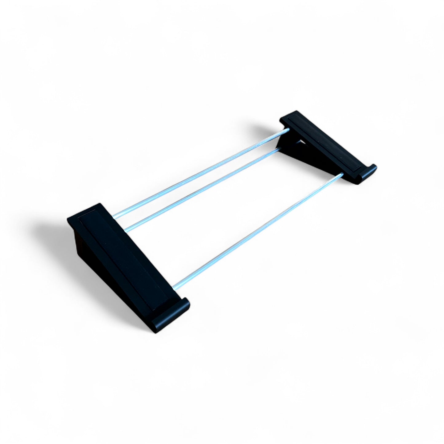 3D printed Arturia Keystep Midi Keyboard 20 degree stand by Cold Earth Industries, shown in black on a white background