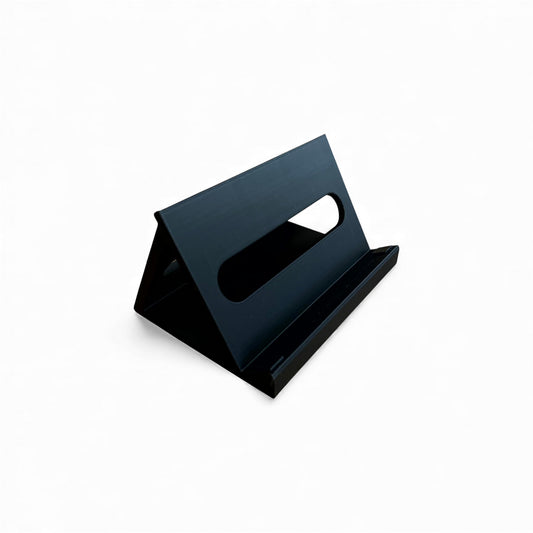 3D printed Korg Nu:Tekt NTS-2 Oscilloscope 60 degree stand by Cold Earth Industries, shown in black on a white background