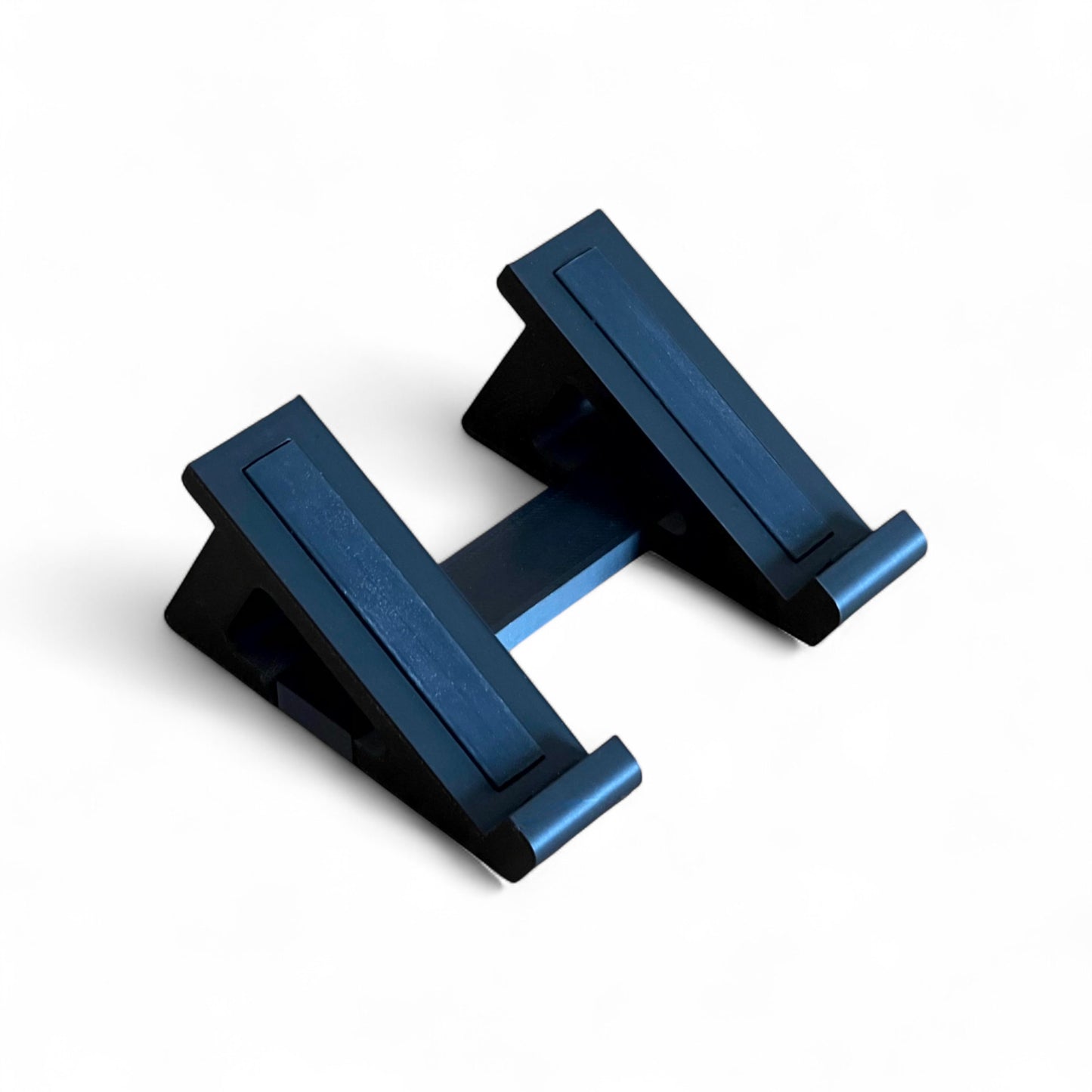 3D printed Korg Nu:Tekt NTS-2 Oscilloscope FX 30 degree stand by Cold Earth Industries, shown in black on a white background