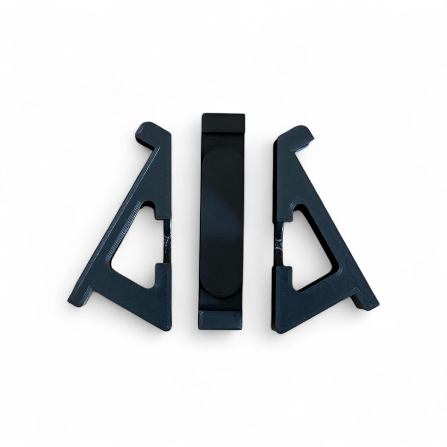 3D printed Korg Nu:Tekt NTS-2 Oscilloscope FX 30 degree stand by Cold Earth Industries, shown in seperate parts in black on a white background