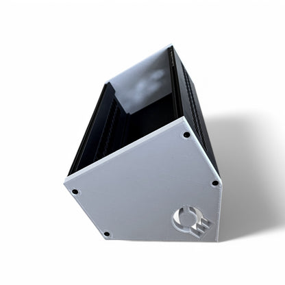 3D printed 62HP 3U Eurorack modular synthesizer case by Cold Earth Industries, shown side view with black body and white side panels on a white background – custom desktop skiff enclosure.