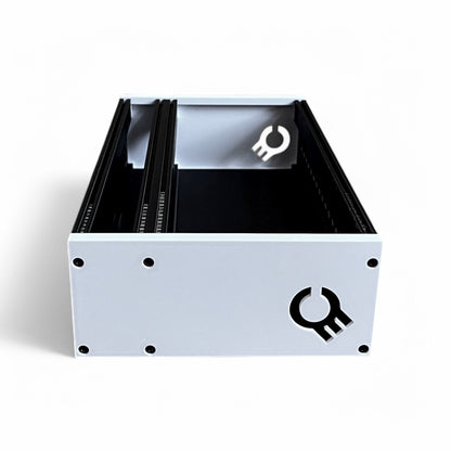 3D printed 62HP 4U Eurorack modular synthesizer case by Cold Earth Industries, shown side view with black body and white side panels on a white background – custom desktop skiff enclosure.