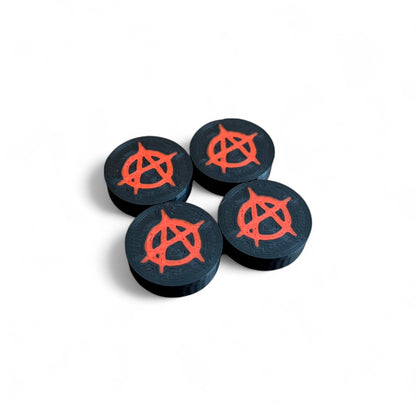 3D printed Anarchy Sign Guitar Pedal Footswitch Topper THIN Version by Cold Earth Industries, 4 shown in black with a red anarchy symbol on a white background.