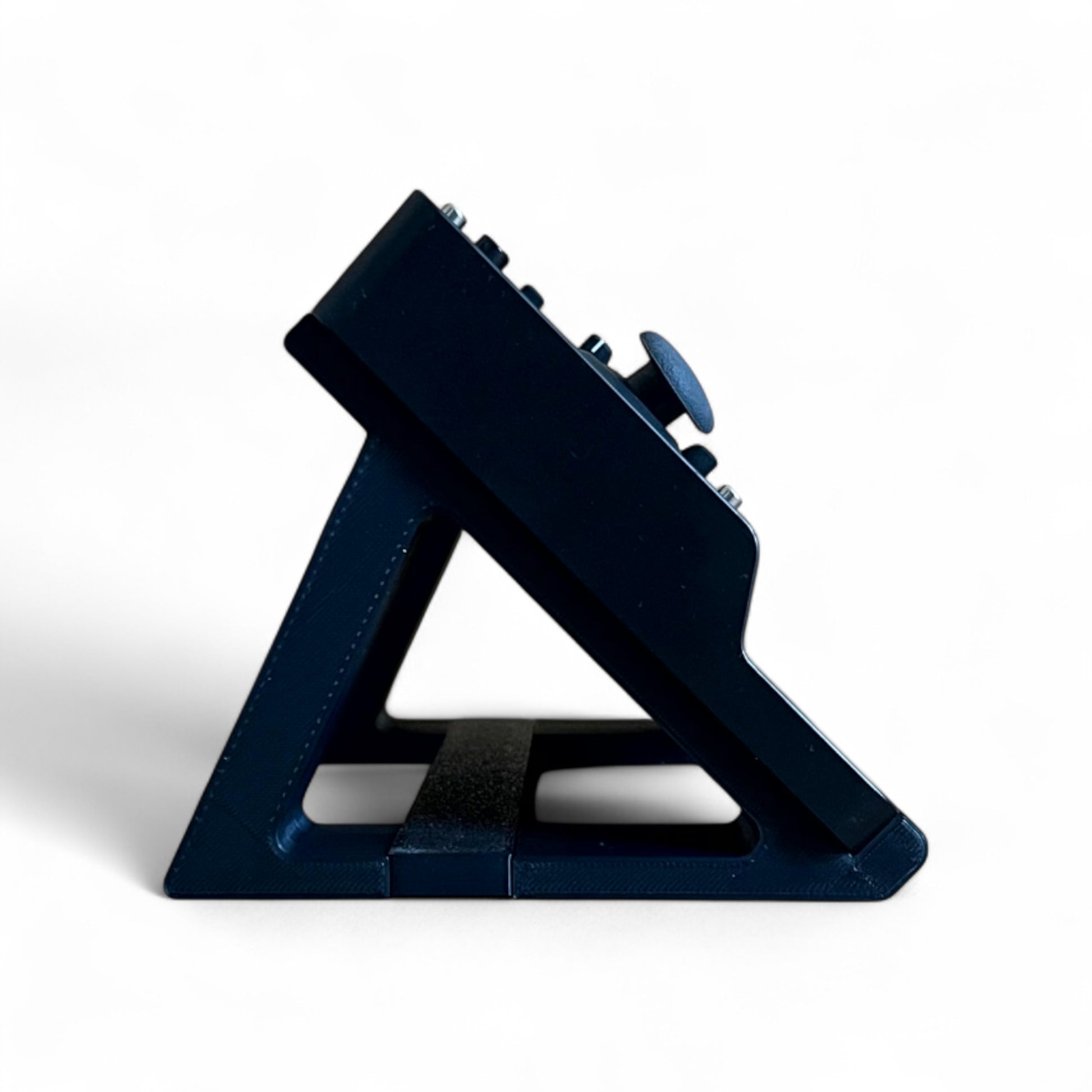 3D printed Behringer Pro VS Mini JT PHARA-O Synth 45 degree stand by Cold Earth Industries, shown side view in black on a white background with Pro VS Mini (not included) – custom desktop stands.