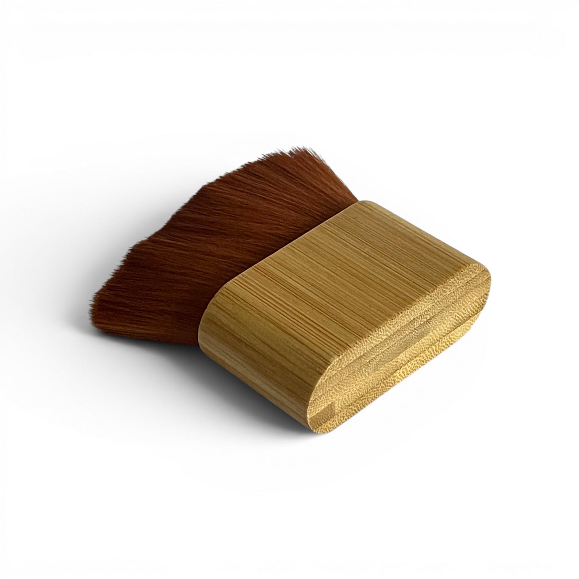 Soft, high-density nylon bristles on the Cold Earth Industries Synth Duster, ideal for safely removing dust from sensitive synth controls and surfaces.
