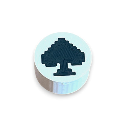 Spade Guitar Pedal Footswitch Toppers for 8.5mm / 10mm / 11mm Foot Switches. 3D printed by Cold Earth Industries, shown on a white topper with a black spade on top, against a white background.