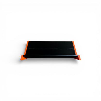 3D printed Guitar Pedal Desktop Stand - Open Sides 400mm x 150mm 60 Degree Pedalboard & Synth Stand stand by Cold Earth Industries, shown front view in black with Orange Sides, on a white background – custom desktop stands.