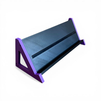 3D printed Guitar Pedal Desktop Stand - Open Sides 400mm x 150mm 60 Degree Pedalboard & Synth Stand stand by Cold Earth Industries, shown in black with purple Sides, on a white background – custom desktop stands.
